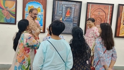 Visitors and artists at the Raj-Drishti art exhibition underway at Lalit Kala Academy Visitors and artists at the Raj-Drishti art exhibition underway at Lalit Kala Academy