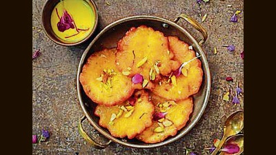 One smell, sight and taste that’s indeed synonymous with the monsoon is that of malpuas. (Shutterstock) One smell, sight and taste that’s indeed synonymous with the monsoon is that of malpuas. (Shutterstock)
