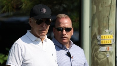 US President Joe Biden (L) departs the beach on August 10, 2024, in Rehoboth Beach, Delaware. (AFP) US President Joe Biden (L) departs the beach on August 10, 2024, in Rehoboth Beach, Delaware. (AFP)