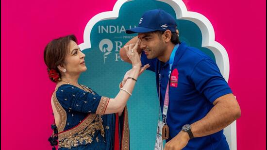 IOC member Nita Ambani applies tilak to the Olympic silver medallist Neeraj Chopra. (ANI)