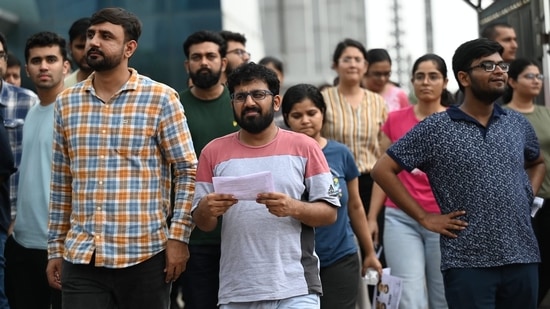 Aspirants leave exam centre after appearing for NEET PG 2024 exam in Lucknow.(Deepak Gupta)