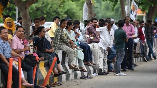 Parents and guardians wait for the candidates to complete NEET PG 2024 exam in Lucknow(Deepak Gupta)