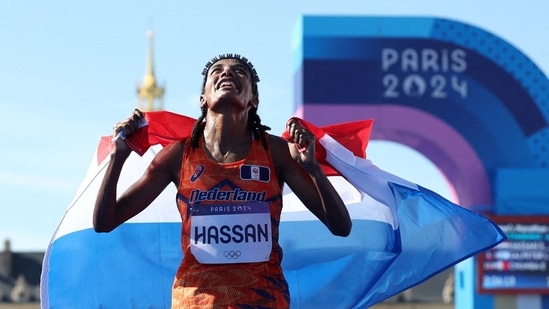 Sifan Hassan of Netherlands celebrates at Invalides after winning gold. (REUTERS)