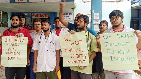 Junior doctors and medical students stage a protest outside North Bengal Medical College and Hospital (NBMC&H) against the sexual assault and murder of a postgraduate trainee doctor in RG Kar Medical College & Hospital, in Kolkata, Sunday.(PTI)