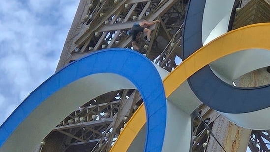 In this photo, a man climbs the Eiffel Tower, during the 2024 Summer Olympics(AP)