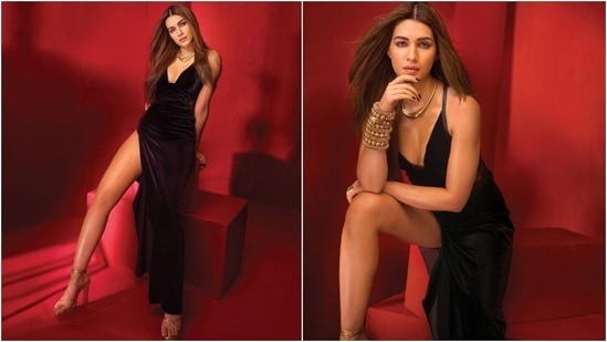 The second look shows Kriti in a black velvet gown featuring a deep halter neckline, a risqué thigh-high slit on the side, and a figure-hugging fit. She wore the ensemble with a gold choker necklace, gold pumps, and a chunky bracelet. Lastly, loose tresses, darkened brows, mascara-adorned lashes, rouge-tinted cheeks, pink lips, and smoky eyes rounded off the glam. (Instagram)