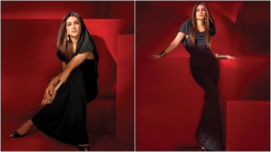 The last look shows Kriti in a floor-length black gown featuring a hood detail, a bodycon silhouette, and half-length sleeves. She wore the ensemble with heels, bracelets, rings, earrings, and striking makeup. (Instagram)