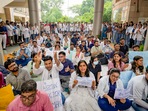 Medics stage a protest against the sexual assault and murder of a postgraduate trainee doctor in Kolkata(PTI) Medics stage a protest against the sexual assault and murder of a postgraduate trainee doctor in Kolkata(PTI)