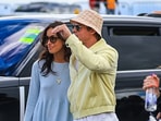 Ines de Ramon and Brad Pitt hold hands at the British Grand Prix.