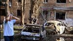 A man reacts while standing next to burnt-out remains of cars in the courtyard of a multi-storey residential building, which according to local authorities was hit by debris from a destroyed Ukrainian missile, in the course of Russia-Ukraine conflict in Kursk, Russia, on Sunday. (REUTERS) A man reacts while standing next to burnt-out remains of cars in the courtyard of a multi-storey residential building, which according to local authorities was hit by debris from a destroyed Ukrainian missile, in the course of Russia-Ukraine conflict in Kursk, Russia, on Sunday. (REUTERS)
