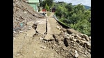 A sinking road in Mandi town on Monday. (Birbal Sharma/HT) A sinking road in Mandi town on Monday. (Birbal Sharma/HT)