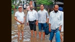 Residents on a waterlogged lane outside Ambala district courts on Monday. (HT Photo) Residents on a waterlogged lane outside Ambala district courts on Monday. (HT Photo)