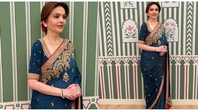Nita Ambani dazzles at Paris Olympics in indigo saree from the 70s and a gorgeous rose-adorned hairdo (Instagram) Nita Ambani dazzles at Paris Olympics in indigo saree from the 70s and a gorgeous rose-adorned hairdo (Instagram)
