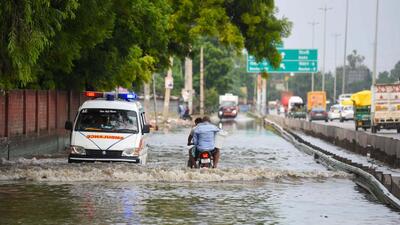 A waterlogged stretch of NH-48 service road at Khandsa village in Gurugram on Monday. (Parveen Kumar/HT) A waterlogged stretch of NH-48 service road at Khandsa village in Gurugram on Monday. (Parveen Kumar/HT)