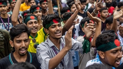 Students chant slogans as they protest to demand accountability and trial against Bangladesh's Sheikh Hasina, near Dhaka University on August 12. (AFP) Students chant slogans as they protest to demand accountability and trial against Bangladesh's Sheikh Hasina, near Dhaka University on August 12. (AFP)
