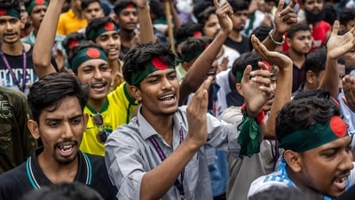 Students chant slogans as they protest to demand accountability and trial against Bangladesh's Sheikh Hasina, near Dhaka University on August 12. (AFP) Students chant slogans as they protest to demand accountability and trial against Bangladesh's Sheikh Hasina, near Dhaka University on August 12. (AFP)