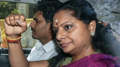 BRS leader K Kavitha gestures to her supporters outside the Rouse Avenue Court in Delhi before a hearing in connection with the Delhi excise policy case in April 2024. (ANI P hoto) BRS leader K Kavitha gestures to her supporters outside the Rouse Avenue Court in Delhi before a hearing in connection with the Delhi excise policy case in April 2024. (ANI P hoto)
