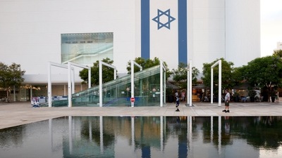 A boy skates near a fountain, amid the ongoing conflict between Israel and Hamas, at a square in Tel Aviv, Israel August 12, 2024. REUTERS/Florion Goga