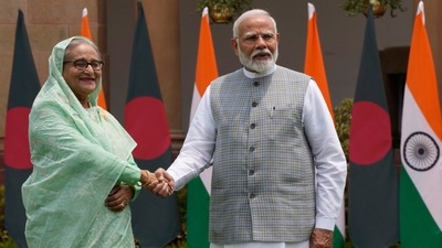 Prime Minister Narendra Modi, right, shakes hand with former Bangladeshi counterpart Sheikh Hasina before their delegation level meeting in New Delhi on June 22. (AP/File Photo) Prime Minister Narendra Modi, right, shakes hand with former Bangladeshi counterpart Sheikh Hasina before their delegation level meeting in New Delhi on June 22. (AP/File Photo)