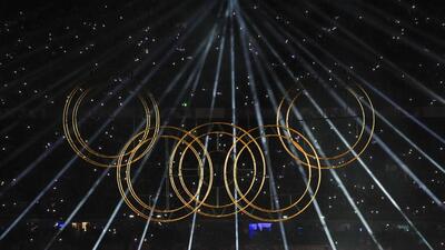 Lights illuminate the Olympic rings during a performance at the closing ceremony of the Paris Olympics. (PTI) Lights illuminate the Olympic rings during a performance at the closing ceremony of the Paris Olympics. (PTI)