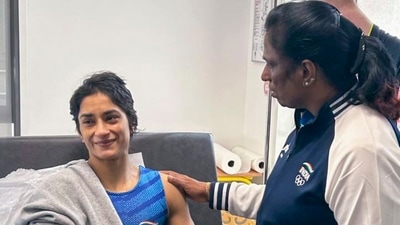 Indian Olympics Association (IOA) President PT Usha meets wrestler Vinesh Phogat after the latter was hospitalised following her disqualification from the Paris Olympics as she was found overweight ahead of her women's 50kg final match (PTI)