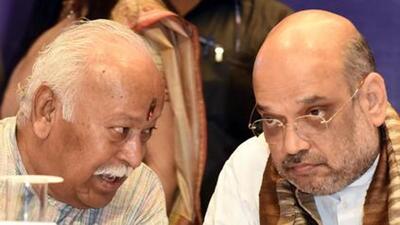 Rashtriya Swayamsevak Sangh chief Mohan Bhagwat with Union minister Amit Shah. (HT File Photo) Rashtriya Swayamsevak Sangh chief Mohan Bhagwat with Union minister Amit Shah. (HT File Photo)
