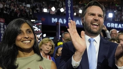 Republican vice-presidential candidate Senator JD Vance, R-Ohio, and his wife Usha Chilukuri Vance arrive on the floor during the first day of the 2024 Republican National Convention at the Fiserv Forum, on Monday. (AP) Republican vice-presidential candidate Senator JD Vance, R-Ohio, and his wife Usha Chilukuri Vance arrive on the floor during the first day of the 2024 Republican National Convention at the Fiserv Forum, on Monday. (AP)