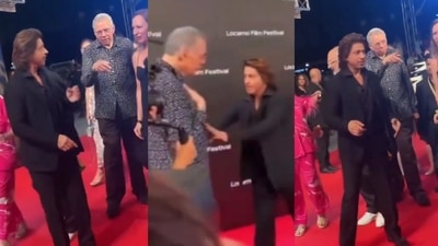 Shah Rukh Khan and the man he was accused of pushing on the red carpet