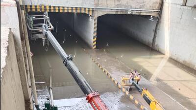 The Bajghera underpass was closed for traffic as it got flooded, and eight pumps that are permanently deployed at the spot were put into service to dewater the structure on Sunday itself, said an NHAI official. (HT Photo) The Bajghera underpass was closed for traffic as it got flooded, and eight pumps that are permanently deployed at the spot were put into service to dewater the structure on Sunday itself, said an NHAI official. (HT Photo)