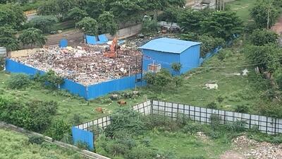 The Noida High Rise Federation (NHRF) has now sought action from authorities, citing serious health concerns among residents of these societies, and urged for relocating the dumping sites. (HT Photo) The Noida High Rise Federation (NHRF) has now sought action from authorities, citing serious health concerns among residents of these societies, and urged for relocating the dumping sites. (HT Photo)