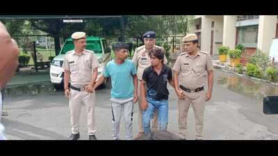 Two of the accused in police custody in Karnal on Monday. (HT Photo)