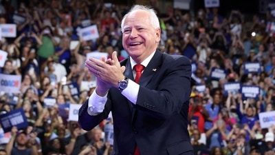 Minnesota Governor and Democratic vice presidential candidate Tim Walz gestures during a campaign rally at the Thomas and Mack Center, University of Nevada in Las Vegas, Nevada, on August 10, 2024. (AFP) Minnesota Governor and Democratic vice presidential candidate Tim Walz gestures during a campaign rally at the Thomas and Mack Center, University of Nevada in Las Vegas, Nevada, on August 10, 2024. (AFP)