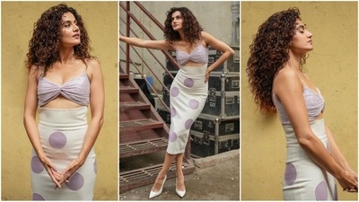Taapsee Pannu’s glam game is on fire as she continues to serve back-to-back chic looks. After making waves with her stunning saree styles, she’s now turning heads in a cut-out bodycon dress. This sleek number features spaghetti straps and a body-hugging silhouette adorned with a playful purple polka dot print.&nbsp; (Instagram)