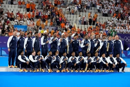 The Indian men's hockey team with their bronze medal at the 2024 Paris Olympics. It makes the first time that they have won consecutive Games medals since they won bronze at the 1968 and 1972 Olympics. (AP) The Indian men's hockey team with their bronze medal at the 2024 Paris Olympics. It makes the first time that they have won consecutive Games medals since they won bronze at the 1968 and 1972 Olympics. (AP)