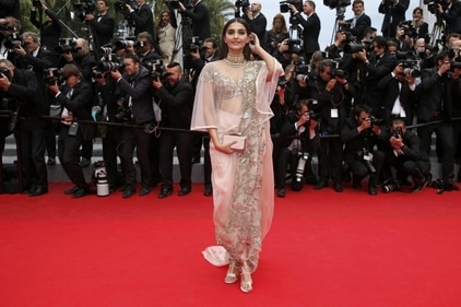 Sonam Kapoor styled in reimagined Anamika Khanna saree at Cannes 2013. (Getty)