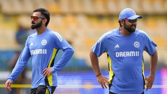 Rohit Sharma and Virat Kohli before the first ODI cricket match of a series between India and Sri Lanka