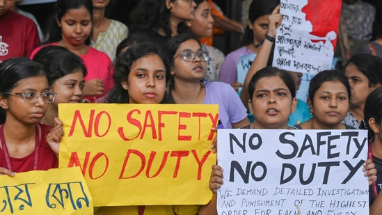 Doctors and nursing staff protest against the recent rape and murder of a woman doctor inside the RG Kar Medical College and Hospital, in Kolkata, Sunday. (PTI)