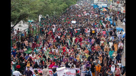 People participate in a protest march against Prime Minister Sheikh Hasina and her government to demand justice for the victims killed in the recent countrywide deadly clashes, in Dhaka, Bangladesh, Saturday, Aug. 3, 2024. (AP Photo/Rajib Dhar) (AP)