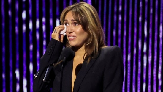 Miley Cyrus reacts as she is honoured at the 2024 Disney Legends Awards during Disney's D23 Expo in Anaheim, California, U.S., August 11, 2024. REUTERS/Mario Anzuoni(REUTERS)