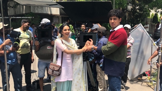 Kiara Advani and Sidharth Malhotra hold hands in a sweet BTS picture from the making of Shershaan. The National Award-winning film released in 2021 and was well received by audiences.&nbsp;