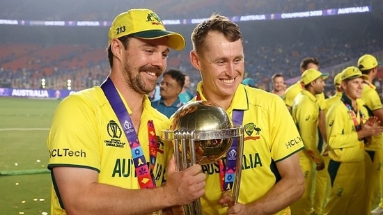 Travis Head (L) and Marcus Labuschagne with the World Cup trophy(Getty)