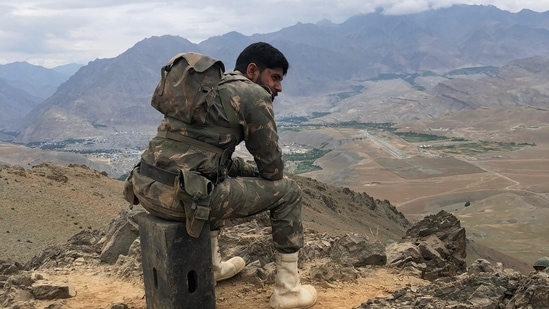 Sidharth takes a rest while shooting for a scene in a particularly rough terrain, 