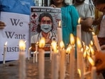 Resident doctors' candle march at copper hospital to protest the rape-murder of a colleague in Kolkata in Mumbai. (Satish Bate/Hindustan Times) Resident doctors' candle march at copper hospital to protest the rape-murder of a colleague in Kolkata in Mumbai. (Satish Bate/Hindustan Times)