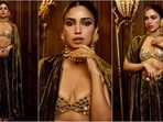 Bhumi Pednekar is elevating glamour to a whole new level with her latest pictures that scream sartorial excellence. The diva continues to slay fashion goals like a pro. Just a few days ago, she stunned in a black shimmer blouse and skirt, and now she's turning heads in a dazzling mirror bralette paired with a velvet ensemble that exudes pure glamour.(Instagram/@bhumipednekar)