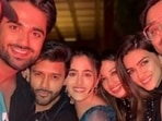 Kriti Sanon and sister Nupur Sanon with Kabir Bahia at a party; Kabir with his close friend Sakshi Dhoni at a match. (File Photos)
