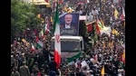 FILE - Iranians follow a truck, center, carrying the coffins of Hamas leader Ismail Haniyeh and his bodyguard during their funeral ceremony at Enqelab-e-Eslami (Islamic Revolution) Sq. in Tehran, Iran, Thursday, Aug. 1, 2024. (AP Photo/Vahid Salemi, File) (AP)