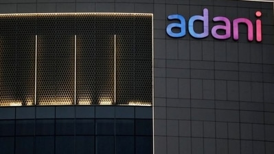 The logo of the Adani Group is seen on the facade of one of its buildings on the outskirts of Ahmedabad. (Reuters)