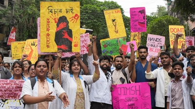 Kolkata: Junior doctors, trainee doctors and medical students protest against the sexual assault and killing of a post-graduate trainee doctor at RG Kar Medical College. (PTI) Kolkata: Junior doctors, trainee doctors and medical students protest against the sexual assault and killing of a post-graduate trainee doctor at RG Kar Medical College. (PTI)
