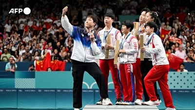 It's an unprecedented image: North and South Korean table tennis medallists taking a selfie together on the podium on July 30. Their two countries have technically been at war since 1953 and tensions are currently extremely high, so it was a rare and welcome sign of cross-border fraternity. Such selfies are common on Olympic podiums, but the moment was still moving for AFP's South Korean photographer Jung Yeon-je. It's an unprecedented image: North and South Korean table tennis medallists taking a selfie together on the podium on July 30. Their two countries have technically been at war since 1953 and tensions are currently extremely high, so it was a rare and welcome sign of cross-border fraternity. Such selfies are common on Olympic podiums, but the moment was still moving for AFP's South Korean photographer Jung Yeon-je.