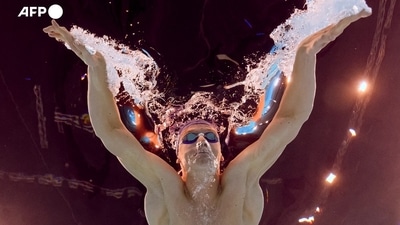 With four golds and a bronze, French swimmer Leon Marchand has been one of the sensations of this Games. The champion was immortalised by Oli Scarff, who snapped an underwater shot illustrating his power during the semi-final of the 200m butterfly on July 30. It was taken with a robotic camera developed over several years by AFP photographer Francois-Xavier Marit. With four golds and a bronze, French swimmer Leon Marchand has been one of the sensations of this Games. The champion was immortalised by Oli Scarff, who snapped an underwater shot illustrating his power during the semi-final of the 200m butterfly on July 30. It was taken with a robotic camera developed over several years by AFP photographer Francois-Xavier Marit. 